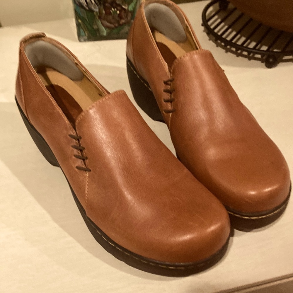 Brown leather clogs